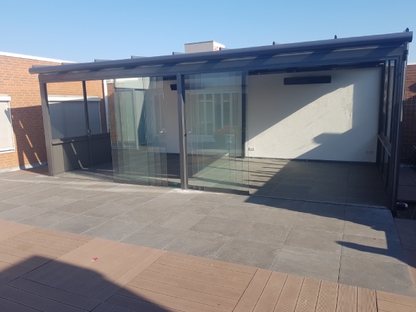 Een terrasoverkapping laten bouwen? Hoveniersbedrijf Stevens kan voor elke tuin een passende overkapping leveren Een terrasoverkapping laten bouwen? Hoveniersbedrijf Stevens kan voor elke tuin een passende overkapping leveren